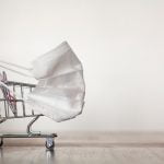 Shopping,Trolley,With,Medical,Mask.,Coronavirus,Pandemic,,Covid-19,Shopping,Concept.