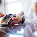 Hand,Of,Customer,Paying,With,Contactless,Credit,Card,With,Nfc