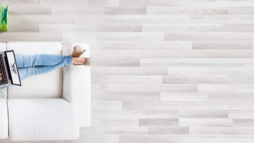 Online,Laptop,Shopper,On,Sofa.,Top,View