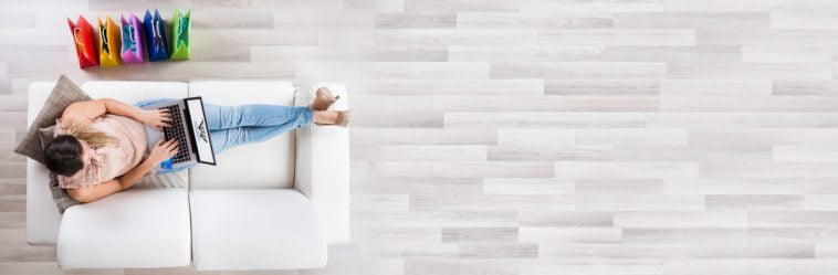 Online,Laptop,Shopper,On,Sofa.,Top,View