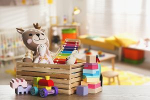 Set,Of,Different,Cute,Toys,On,Wooden,Table,In,Children's