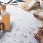 Designer sketching drawing design Brown craft cardboard paper product eco packaging mockup box development template package branding Label . designer studio concept . product, packaging, package, design, designer, template, development, recycle, eco, paper, cardboard, drawing, recycling, pack, branding, sketching, process, mockup, business, creative, packing, art, box, concept, craft, creation, creativity, desk, gift, graphic, imagination, job, label, marketing, office, people, person, plan, pouch, production, professional, project, retail, sketch, style, work, working, workplace