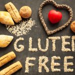 Gluten,Free,Buns,On,Wooden,Background,With,Heart,Shaped,Figure.