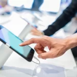 customer choosing a new mobile phone in a shop