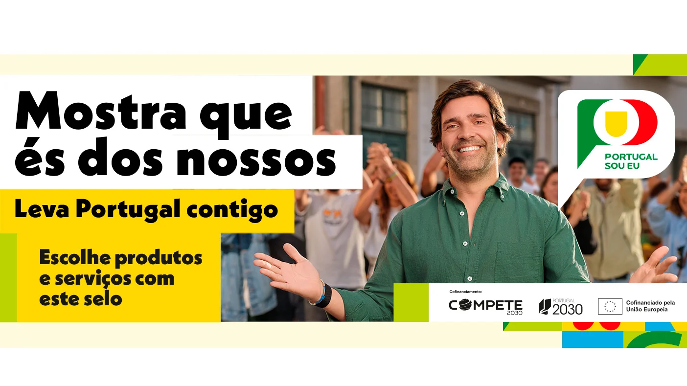 Campanha “Portugal Sou Eu” com homem sorridente em primeiro plano e mensagem a promover o consumo de produtos e serviços nacionais identificados com o selo