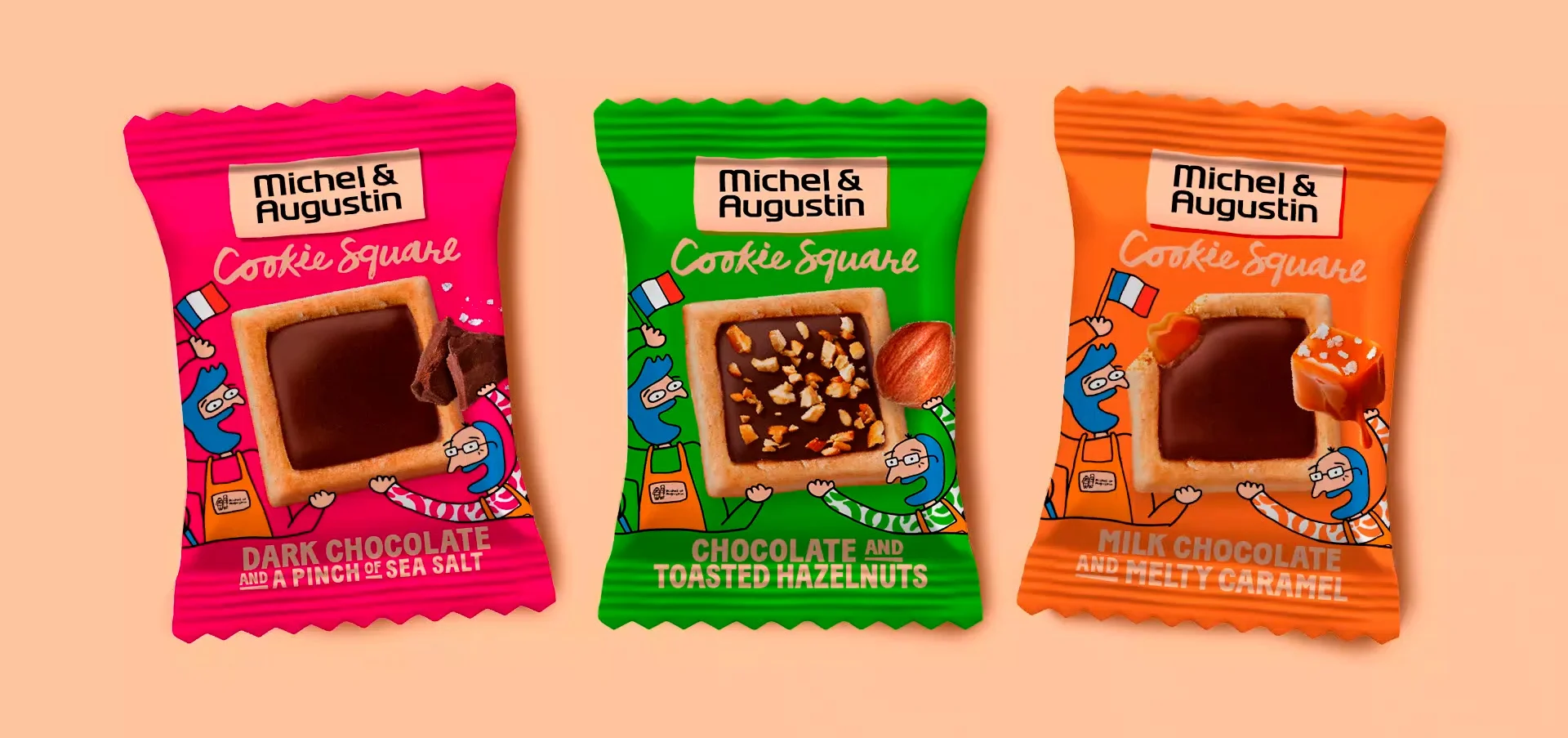 Três embalagens de Cookie Square Michel & Augustin: chocolate negro com sal marinho, chocolate e avelãs tostadas, e chocolate de leite com caramelo